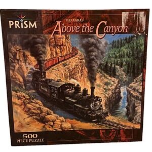 Ted Xaras "Above the Canyon" 500 Piece Puzzle with Coal-Powered Train on Edge